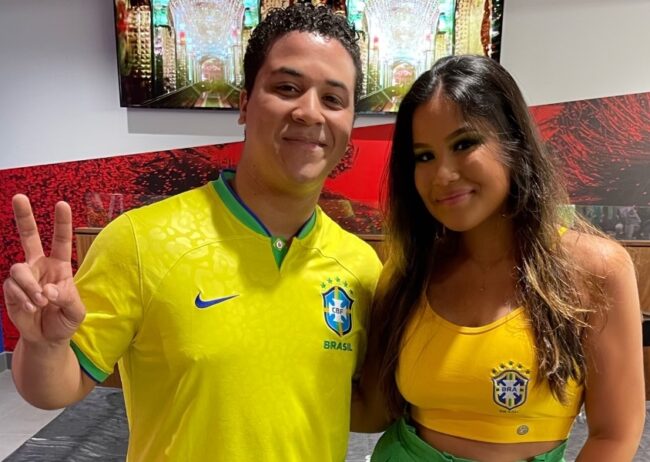 Cabral and Silva cheering on Brazil in the World Cup group stages