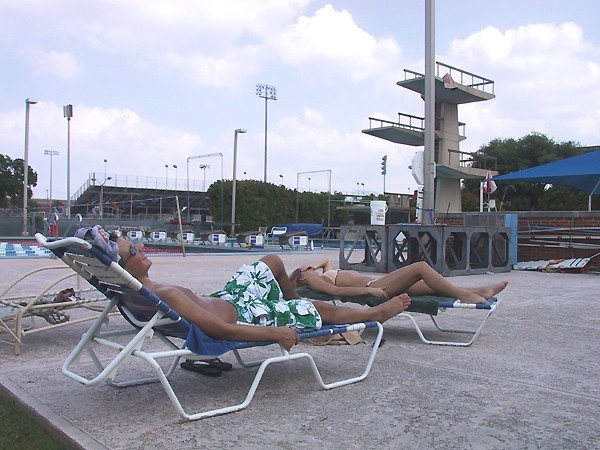 Sunny days, stress bring students to Barr Pool