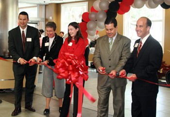 SMU dignitaries help cut the ribbon for the official opening of the Real Food on Campus dining center in Umphrey Lee.