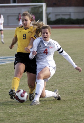 SMUs Alyssa Pembroke (right) fights for the ball against Colorado Colleges Lisa Balsama (left) on Friday.