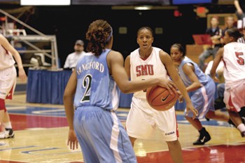 SMU's Jillian Samuels (right) guards against Tulane's Ashley Langford (left).