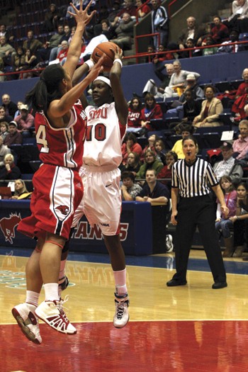 Forward Brittany Gilliam goes up against a Houston defender in a 61-50 win.
