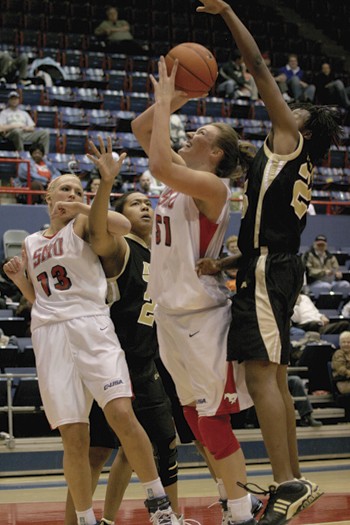 SMUs Catherine Campbell attempts a basket in the Mustangs 73-47 victory over UCF.