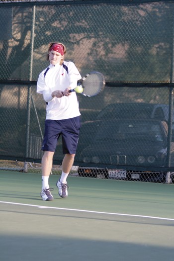 SMUs Oivind Alver hits the ball during Saturdays double-header against Illinois State and Southeastern Oklahoma State at the Bent Tree Country Club.