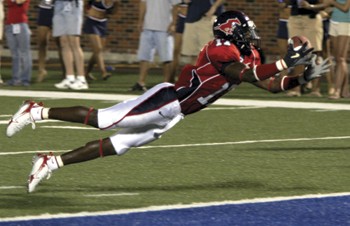 SMU wide receiver Emmanuel Sanders catches a thirty-yard pass for a touchdown during a game against Sam Houston State.