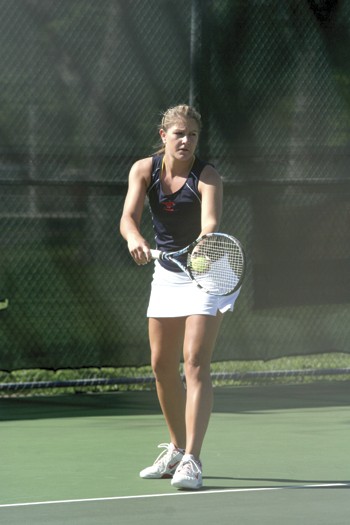 SMUs Jennifer Chay prepares to serve the ball at the ULL match at Garland Tennis Center.
