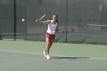 SMUs Monica Neveklovska hits the ball during the match against TCU at Garland Tennis Center.