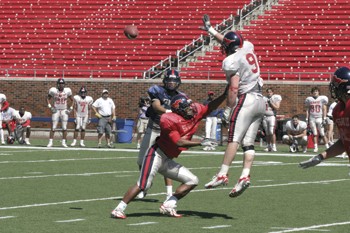 Quarterback Justin Willis passes the ball during a series at the annual Red and Blue Game. Read a wrap of the story on page 4.