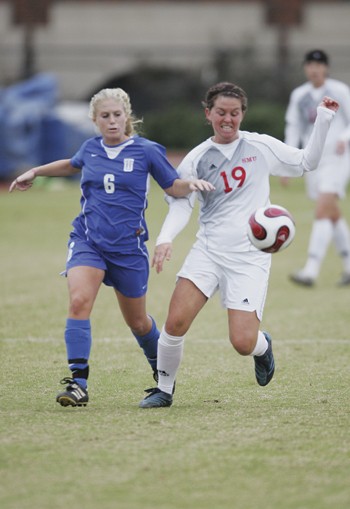 SMUs Allison Brill (right) and Tulsas Melissa Hailey (left) go for the ball during the first round of the C-USA conference tournament last season.