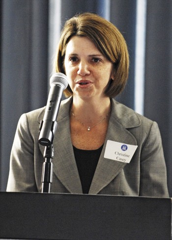 New Vice President of Finance Christine Casey speaks at a reception in her honor.