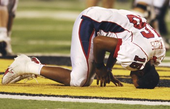 SMU quarterback Justin Willis removed his helmet and was slow to get up after suffering a hard hit in the second quarter against Southern Miss.
