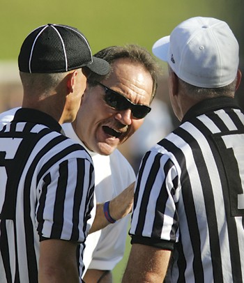 Head coach Phil Bennett had words with the officials at the end of the first half against UTEP. The Mustangs went on to lose the game in overtime.