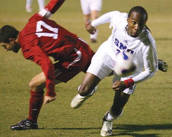 SMU forward Dane Saintus (right) knocks the ball away from Bradley forward Teddy Anderson (left) during a recent game at Wescott Field.  SMU overcame the Gonzaga Bulldogs on Nov. 24 in the first round of the NCAA Tournament.  