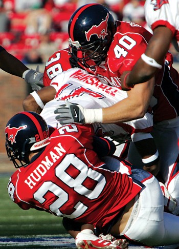 Justin Rogers (40) makes a tackle in a 2006 game.