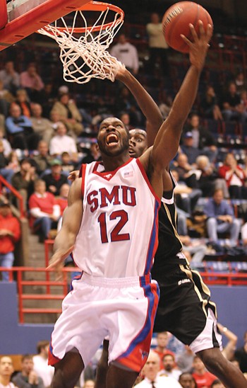 SMUs Jon Killen attacks the hoop for two of his 28 points.