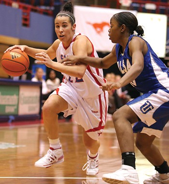 SMUs Katie Cobb drives past Tulsa in Saturday afternoons 70-68 loss.