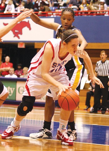 The Mustangs Alice Severin battles down low in the post.