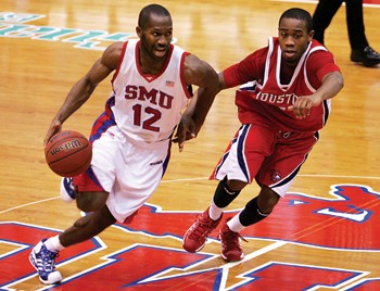 SMUs Jon Killen drives to the basket against the University of Houston Cougars in the Mustangs 99-71 loss last week.