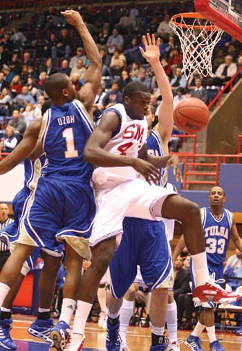 SMUs Papa Dia drives the lane for two of his 18 points in Saturday nights 72-71 loss to Tulsa.