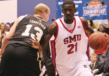 Bamba Fall pushes past rival Central Floirida's Kenrick Zondervan in a 69-67 overtime win on Jan. 26.