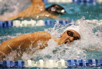 SMU mens swimming competes against the University of Texas.