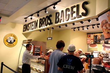 Students grab a bite to eat during school yesterday at Einstein Bros. Bagels located in the basement of the Fincher Building in the Cox School of Business.