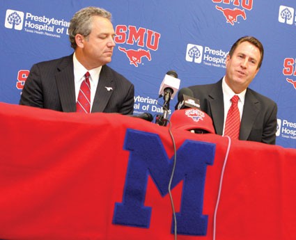 SMU Director of Athletics Steve Orsini (left) listens to Tim McClements (right), new head coach of the mens soccer team, answer questions at a press conference July 23 in Dallas. McClements previously was an assistant coach of the team. Photo by Lindsey Perkins, The Daily Campus