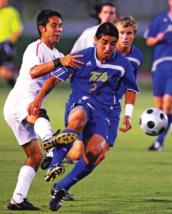 Tulsa forward Jeovahnni Sandez gets the ball from SMU's Daniel Lopez in a 4-1 loss Saturday night at Westcott Field.