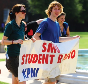 Sarah Nolan and Ben Koopferstock walk with the KPNI banner at the walk on Sunday afternoon