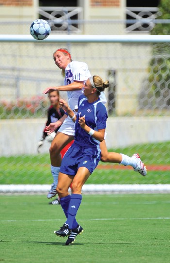 SMU defender Kim Peabody goes up to head the ball in a 0-1 loss to Kansas Sept. 7.