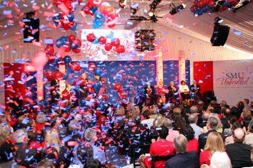 Photo by Lindsey Perkins, The Daily Campus.  Confetti and balloons drop after SMUs official announcement of its goal to raise $750 million over the next five years.