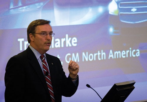 Photo by Casey Lee, The Daily Campus. President of GM North America Troy Clarke speaks to Cox business students and SMU alumni Wednesday in Crum Auditorium about emerging energy technologies.