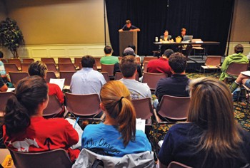 Student Senate members listen to an officer report at a meeting in the Hughes-Trigg Ballroom Tuesday afternoon.