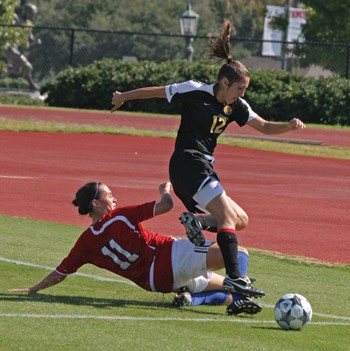 SMU sophomore forward Lauren Sheperd puts the ball out of bounds against USM on Sunday afternoon.