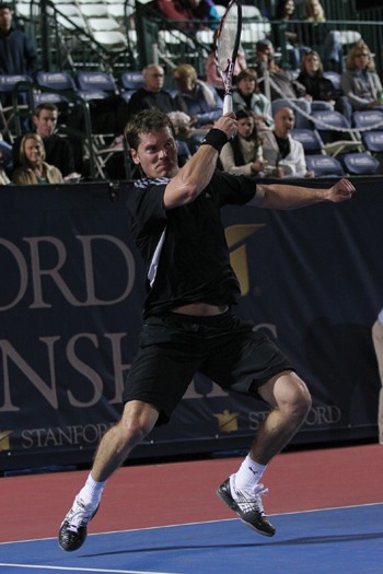 Swede Thomas Enqvist returns a ball to Aaron Krickstein Friday night during the Stanford Championships held at the Turpin Tennis Center.