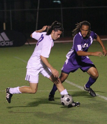 SMUs Gabriel Arredondo keeps the ball away from a University of Central Arkansas defender in a 5-1 win Oct. 12 at Westcott Field.