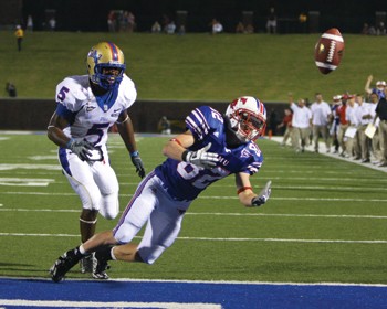 SMU wide receiver Cole Beasley bobbles a pass from quarterback Bo Levi Mitchell at the end of the fourth quarter in a 37-31 loss to Tulsa University. 