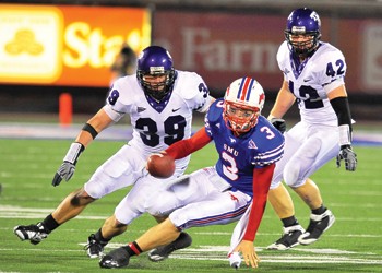 SMU freshman quarterback Bo Levi Mitchell gets sacked by TCU defense in the September 20th game.