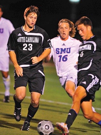 SMUs Adam Still fights for the ball against South Carolina on Wednesday night.
