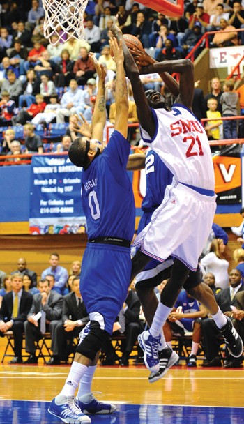 SMU center Bamba Fall (21) goes up for a shot against Memphis last season in Moody Coliseum on March 5.