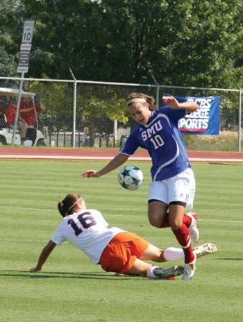SMU forward Logan May (10) is slidetackled by UTEPs Claudia Oliva (16) in a 1-0 victory for the Mustangs on Sept. 28 at Westcott Field.