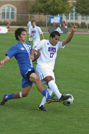 SMU forward Arthur Ivo fights for control of the ball with Kentucky midfielder Tyler Burns Sunday afternoon at Westcott field. SMU lost the final home game 2-1