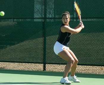SMUs Kristen Reid prepares to return the ball in a tennis match against North Carolina State.
