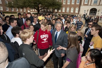 Former President George W. Bush meets students outside of Fondren Science Building Tuesday morning.