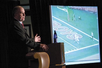 June Jones speaks to SMU fans Wednesday evening at the DoubleTree Hotel about the football players who signed today.