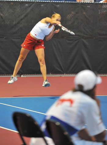 Freshman Aleksandra Malyarchikova serves against TCU last month at Turpin Tennis Stadium.