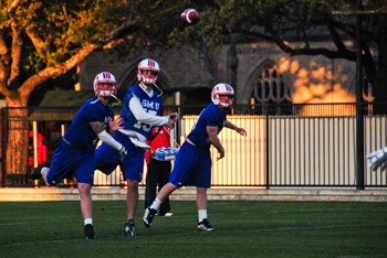 Bo Levi Mitchell leads passing drills at the Mustangs spring practice on Thursday. The football team will have 14 practices before the annual Red & Blue Scrimmage on April 25.