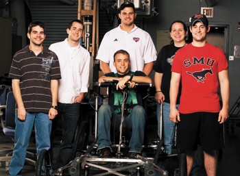 Lyle School of Engineering seniors pose with the product of their Senior Design class.