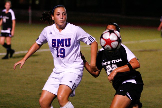 Freshman Kenzie Scovill fights for the ball against a University of North Texas defender in SMUs 1-0 win at Westcott Field on Sept. 4. CASEY LEE/The Daily Campus