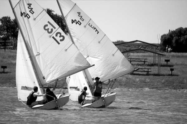 SMU sailers (left) compete against Texas A&M boat (right) during Baylor Regatta. Photo Courtesy of Spencer Eggers